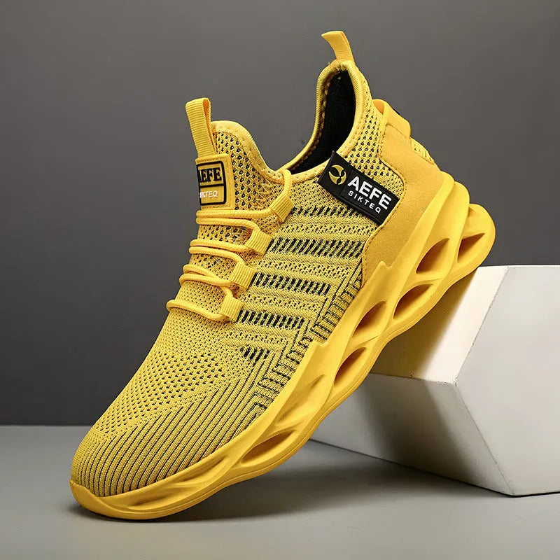 Men's black mesh casual running shoes with cross strap detail and low-top design