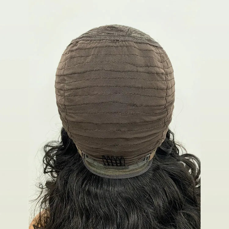 Ombre curly bobo 1b30 human hair lace wig in black with oblique bangs on a mannequin