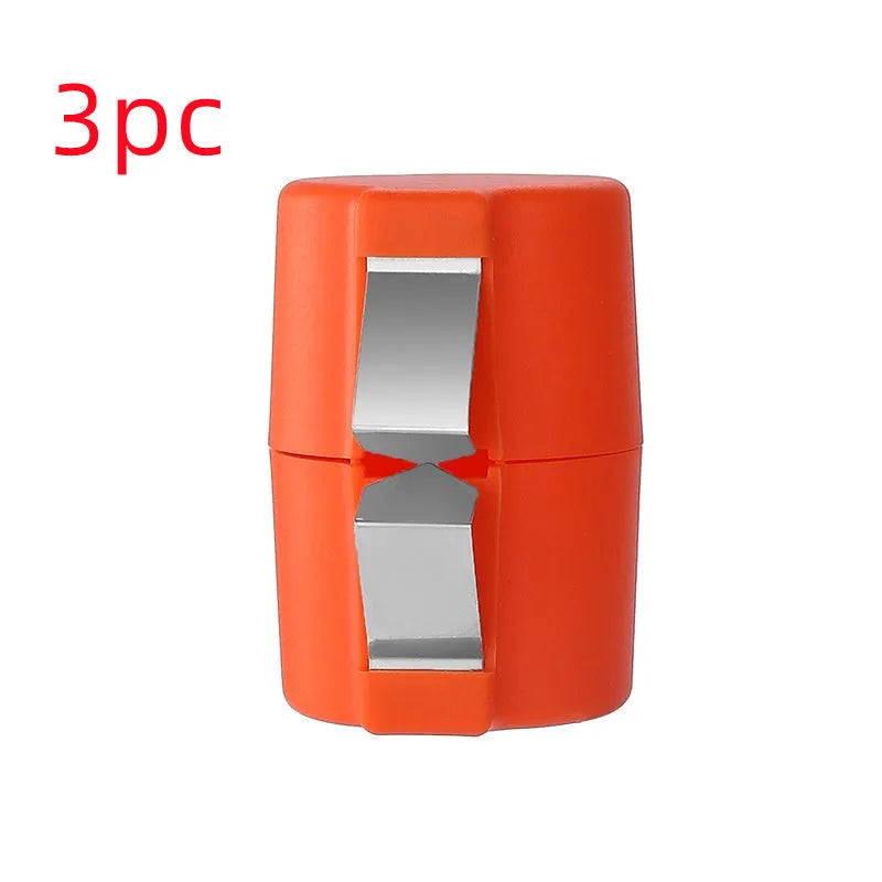 Colourful egg shell opener and beater kitchen tool made of stainless steel and plastic on a kitchen counter.