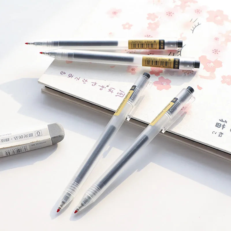 Set of twelve black retractable gel pens with frosted matte barrels and two spare refills.