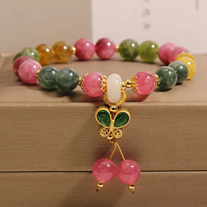 Women's tourmaline butterfly pendant bracelet with natural jade colour stones and rhinestone accents