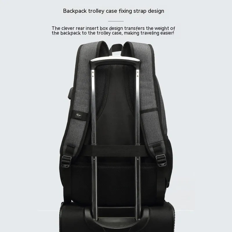 Simple grey and black nylon backpack with USB charging port on side strap.