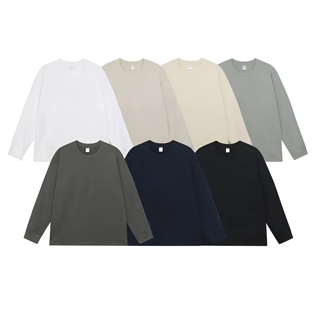 Men's solid colour pure cotton long-sleeved t-shirt shown in loose fit on a hanger.
