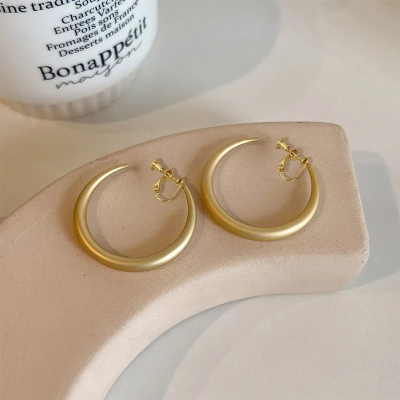 Women's copper circle large earrings in silver gold and matte gold geometric minimalist design