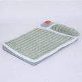Large grey fleece dog mat with removable cover shown in a dog crate.
