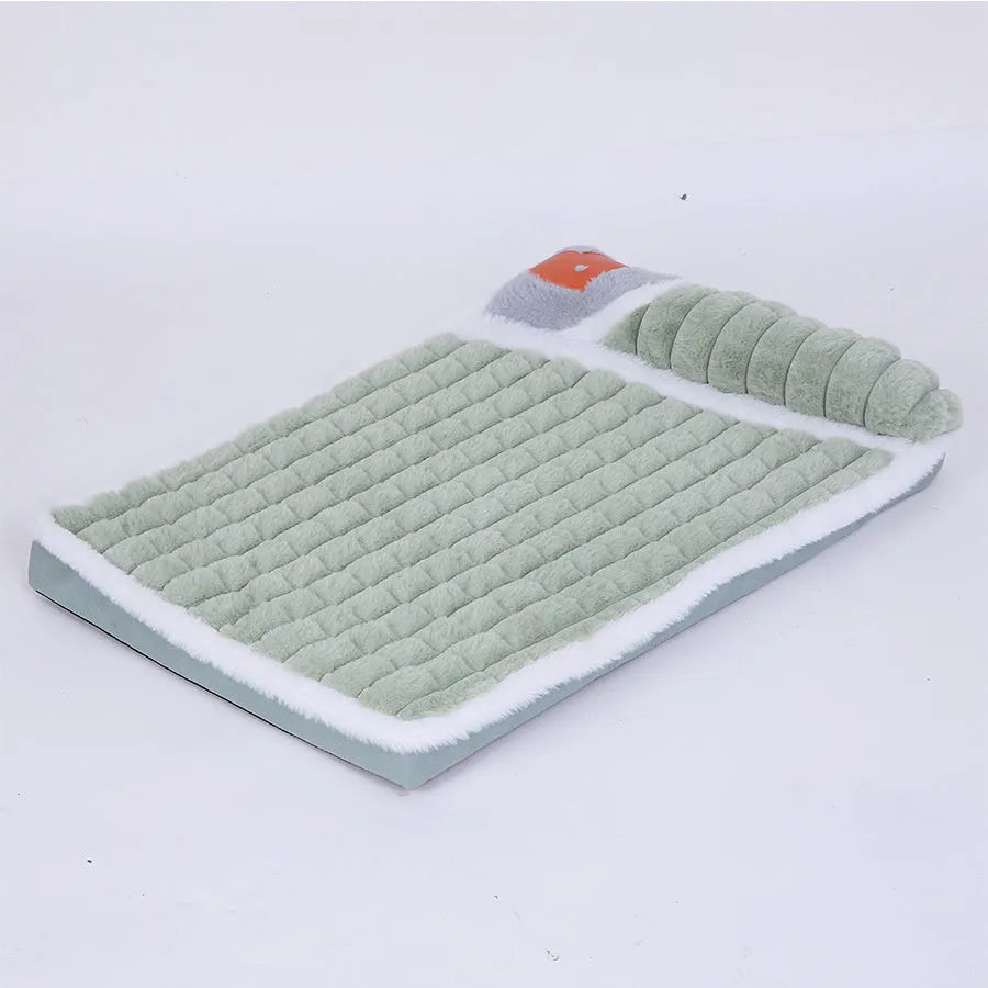 Large grey fleece dog mat with removable cover shown in a dog crate.