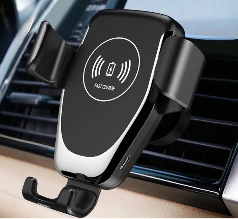 Black car wireless charger mounted on a dashboard, automatically holding an iPhone.