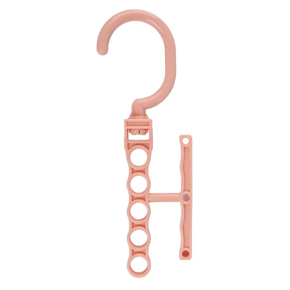 Blue revolving wardrobe hanger with five plastic branches and central handle for clothes organisation