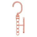 Blue revolving wardrobe hanger with five plastic branches and central handle for clothes organisation