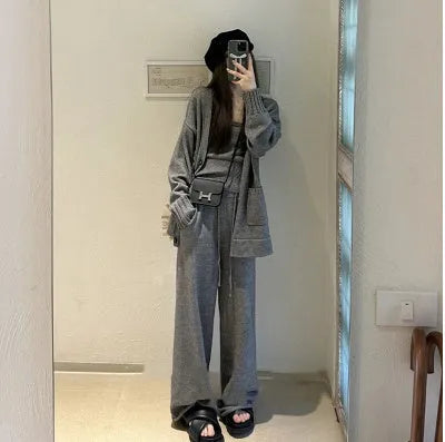 Women's knit three-piece set with cardigan, vest, and suspender pants in wool blend fabric