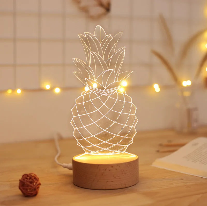 Cartoon pineapple-shaped bedside night light with wooden base and acrylic shade, showing dimmer switch and USB cable.