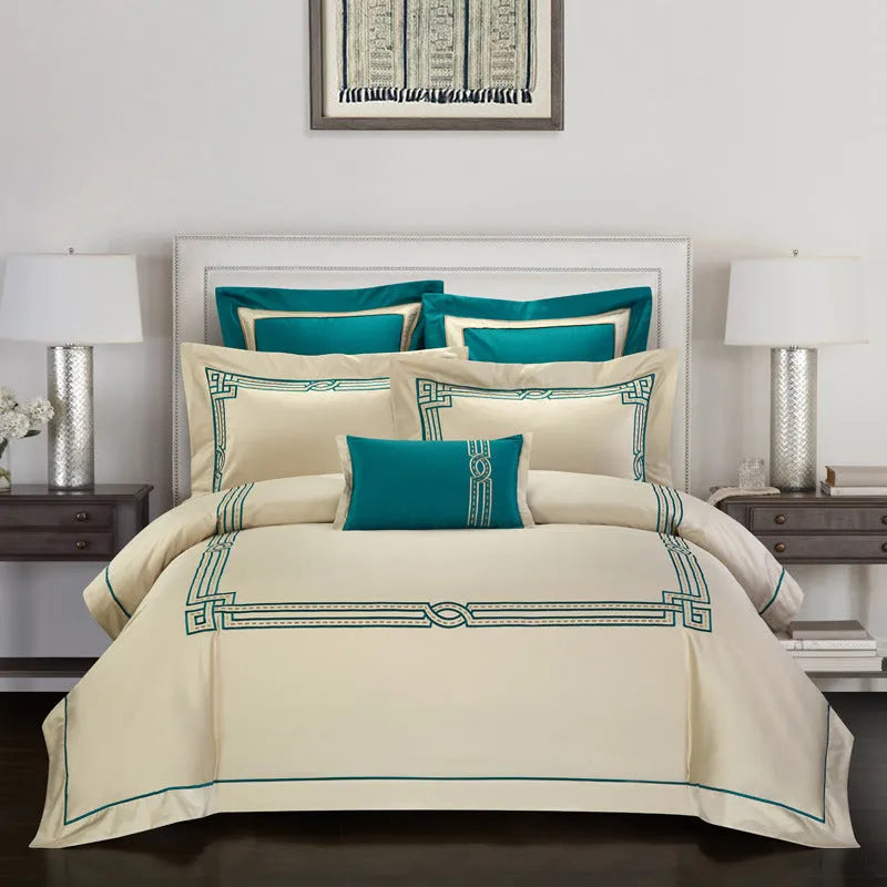 Four-piece cotton duvet cover set with embroidery detail in choice of five patterns.
