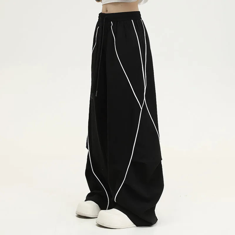 Black striped wide-leg hip hop sports pants with a mid waist and loose fit.