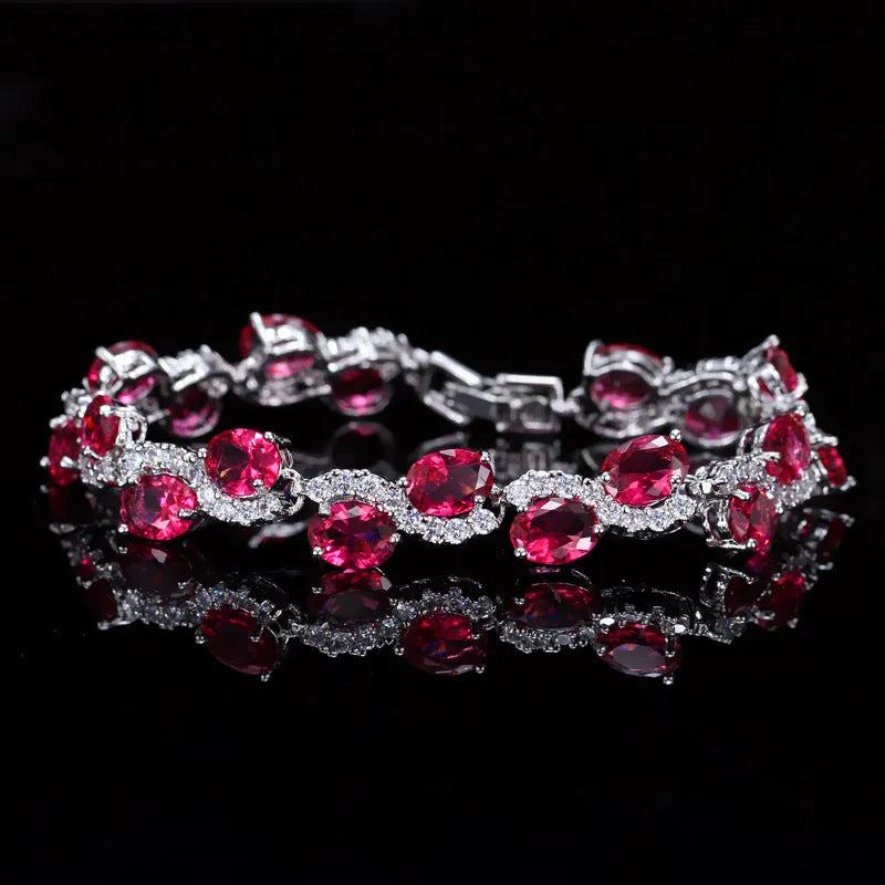 Copper-plated gold bracelet with AAA zircon stones on a wrist, showing geometry design.