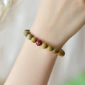 Cinnabar lotus bracelet with guajacwood beads in 8mm and 10mm sizes, retro style, picture colour