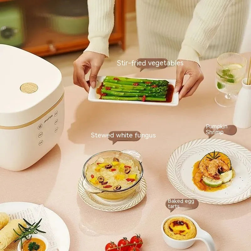White or beige 3L multi-function rice cooker with accessories on kitchen counter