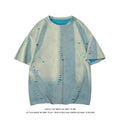 Men's blue cotton blend ripped short sleeve t-shirt showing relaxed fit and distressed detailing