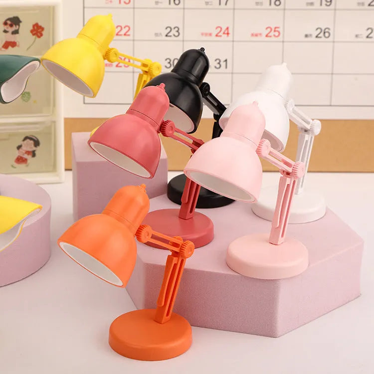 Mini table lamp with magnetic base and book clip, plastic shade, round lamp holder, white colour option
