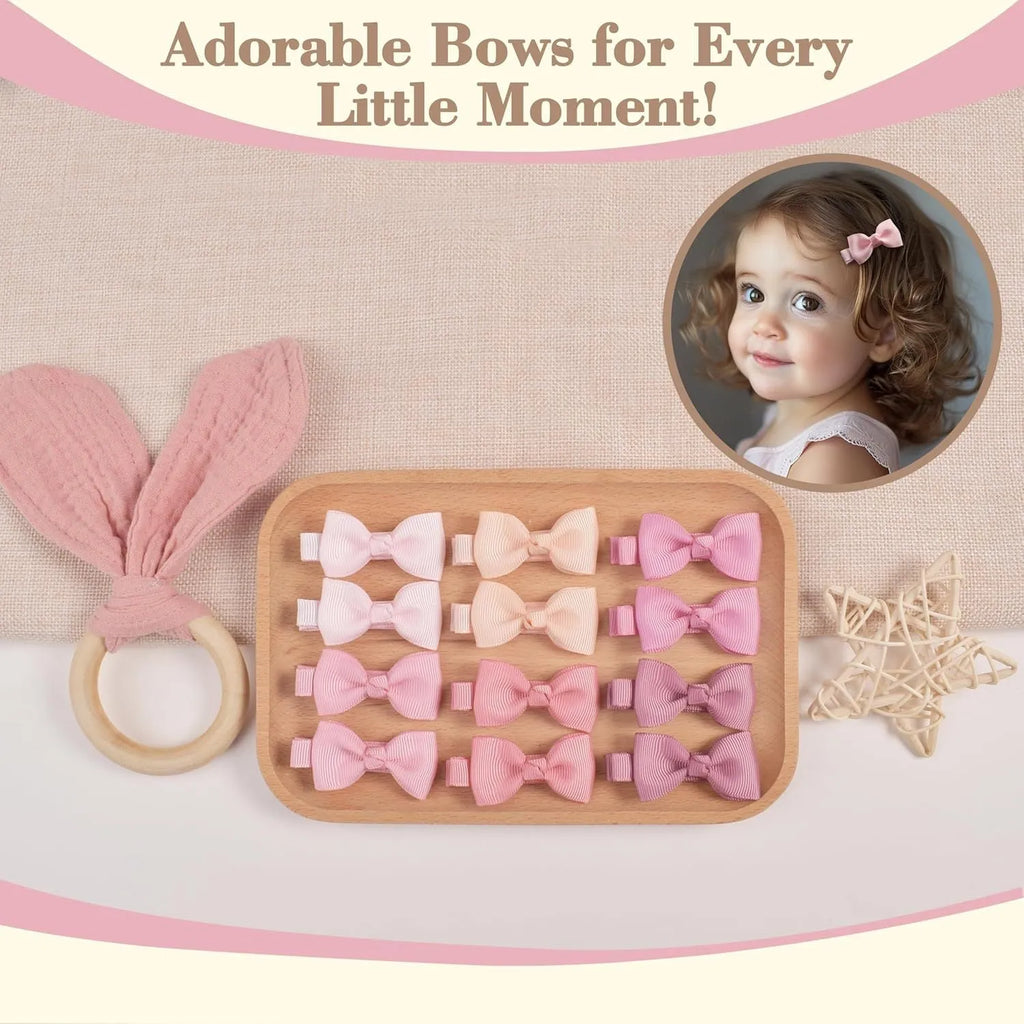 Pastel coloured baby hair clips and bows arranged by colour with non-slip lined interiors visible