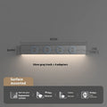 Induction lamp rail socket in black on a sideboard cabinet track with white background