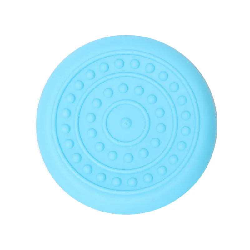 Plastic dog Frisbee disc in green colour, large size, for outdoor fetching and chewing.