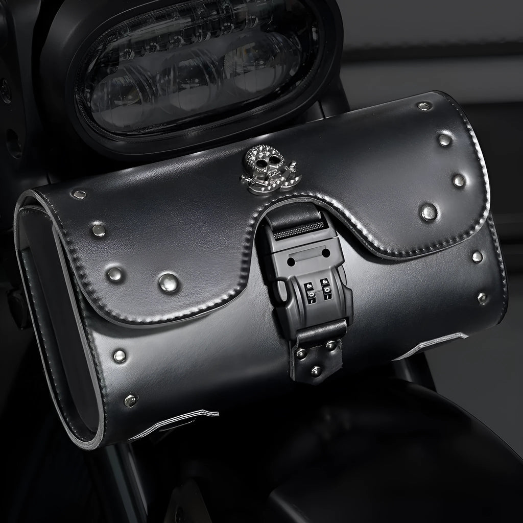 Black PU motorcycle pannier saddlebag mounted on the side of a retro-style bike.