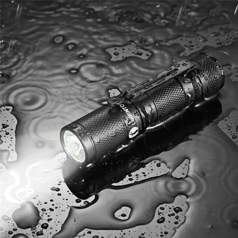 Lumintop Tool AA 2.0 black aluminium flashlight with magnetic tail cap and included accessories