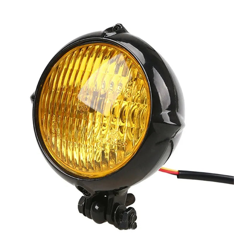 Black electroplated aluminium 12V 35W halogen headlight with an 8cm diameter.