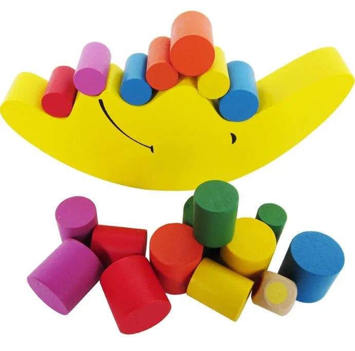 Wooden moon balance game with yellow and blue blocks for toddlers aged 2-4