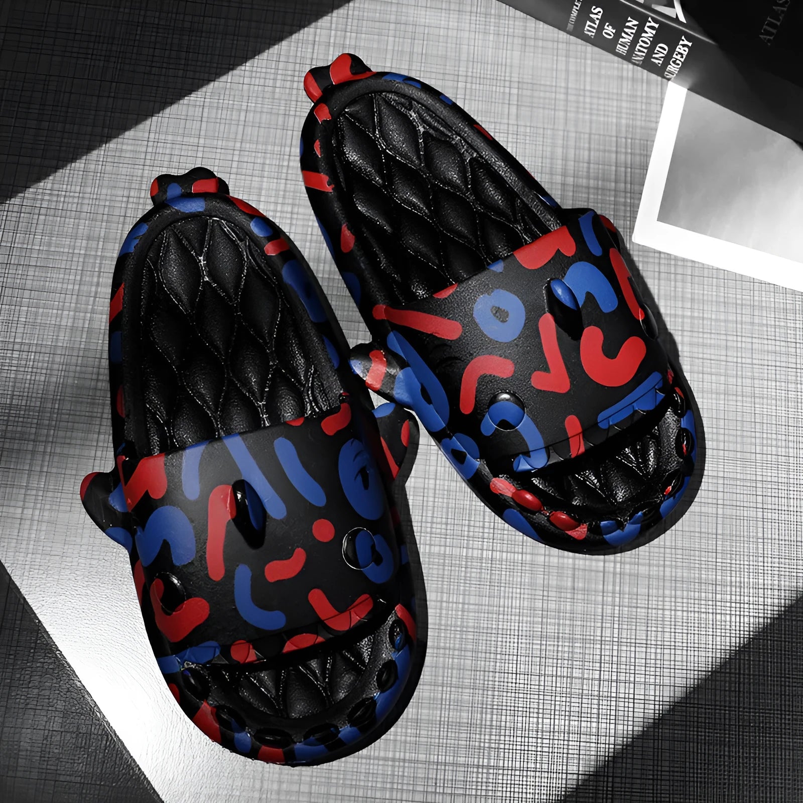 Shark-themed couple EVA slippers in open-toe style on a colour selection background.
