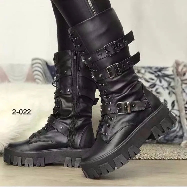 Black women's mid-calf knight boots with metal buckle detail and side zip on a white background
