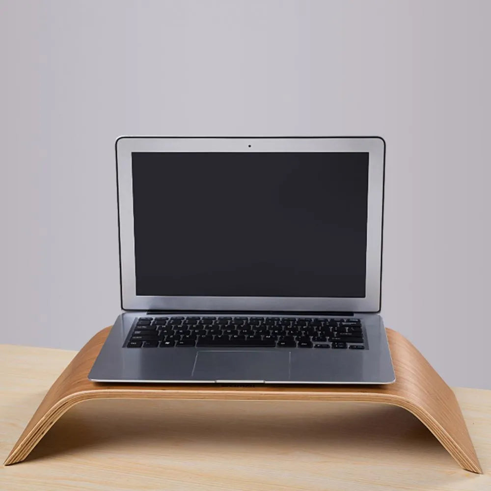 Walnut laptop stability bracket stand in bamboo leather colour on a desk