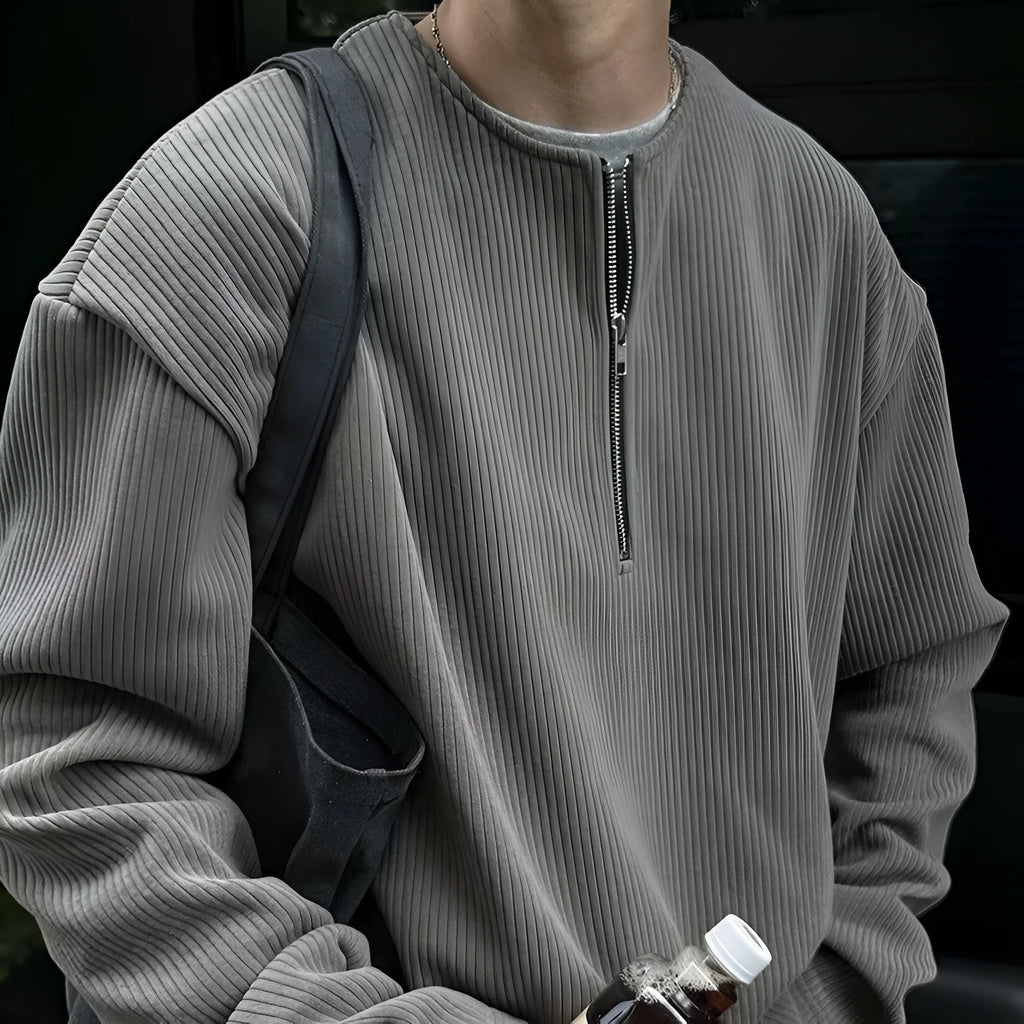 Men's solid grey loose-fit long sleeve pullover top on a hanger.