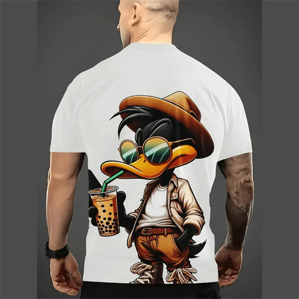 Man wearing a loose-fit grey t-shirt with a raised 3D cartoon print on the front.
