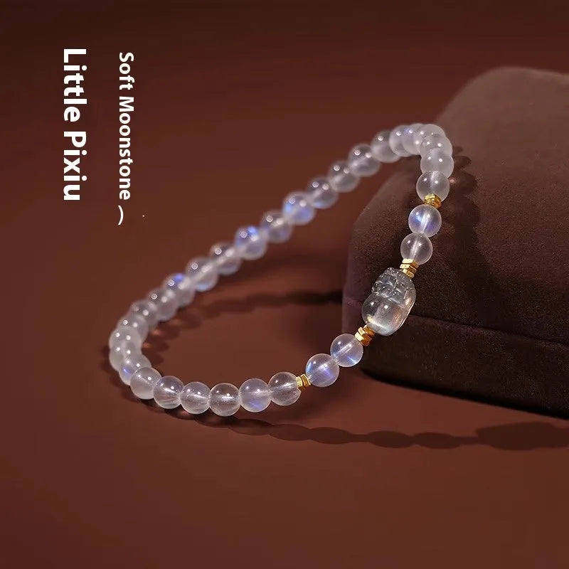Women's moonstone bracelet with zodiac animal modelling in a national style.