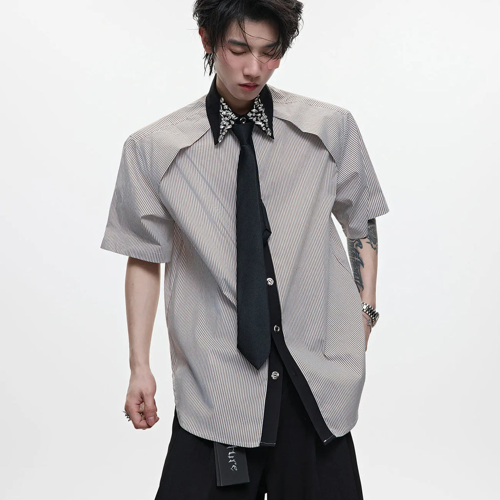 Men's blue and khaki loose fit shirt with diamond tie and patchwork striped pattern.