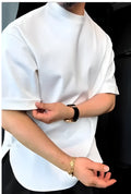 Men's white buttoned placket T-shirt with a round hem, made from soft combed cotton.