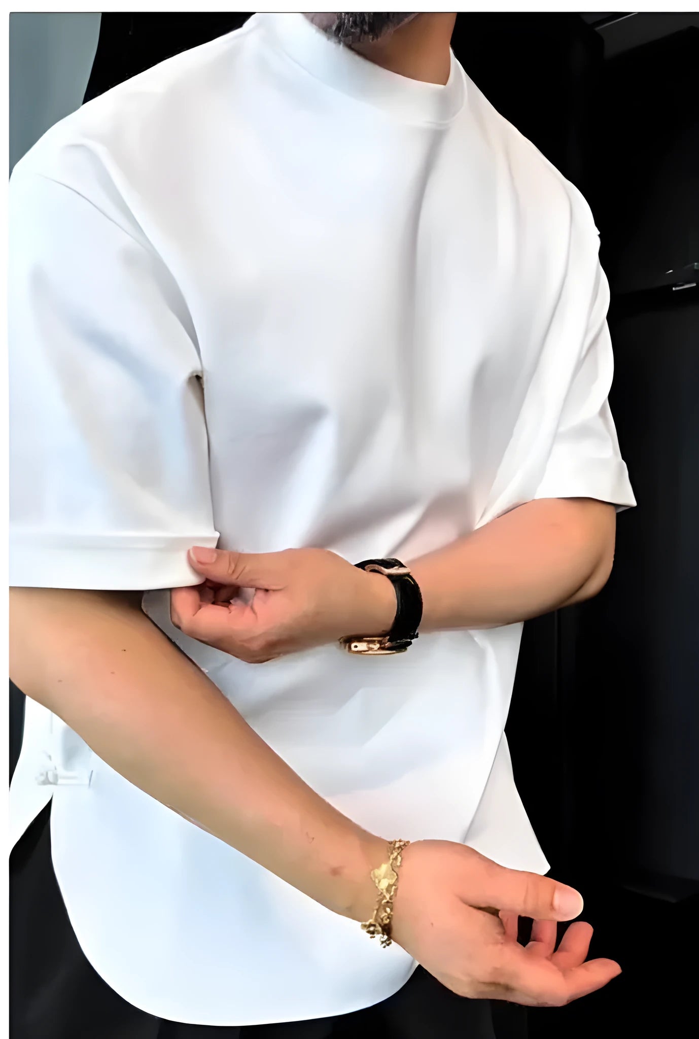 Men's white buttoned placket T-shirt with a round hem, made from soft combed cotton.