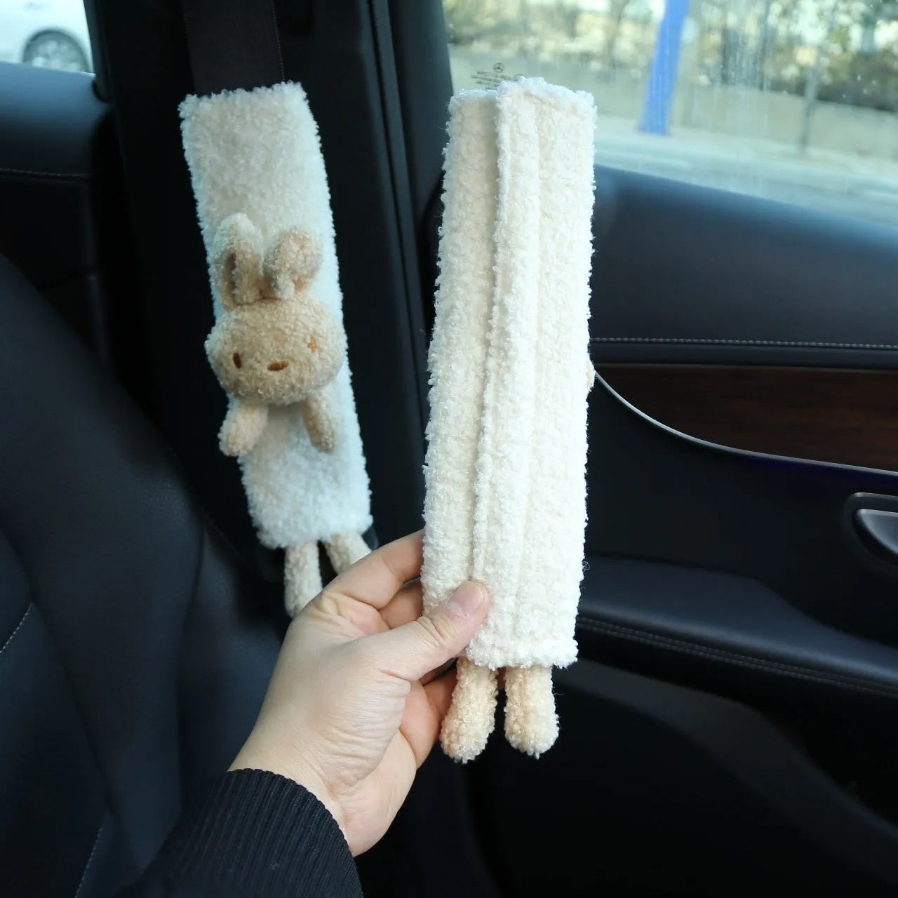 Cartoon plush lamb wool car seatbelt shoulder protector in bear and rabbit designs.