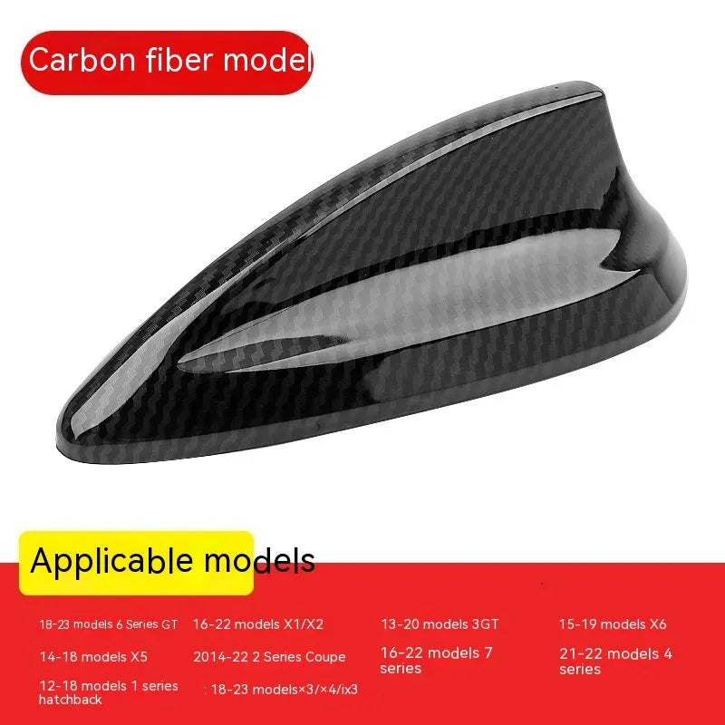 BMW shark fin antenna cover in carbon drill pattern and piano black finishes for Type A, B, and E models.