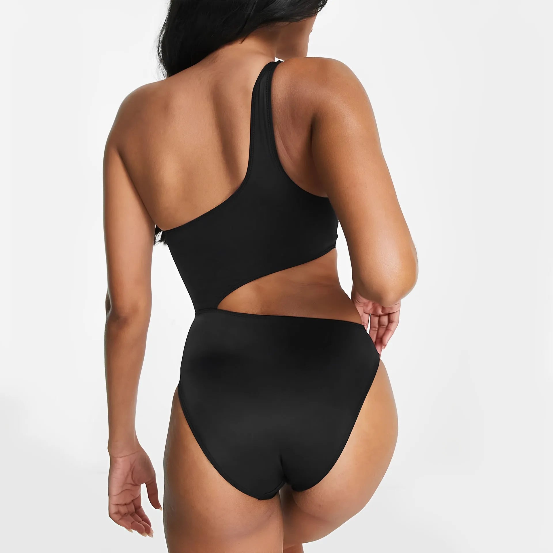 Black women's one-piece swimsuit with white contrast stitching and hollow design detail