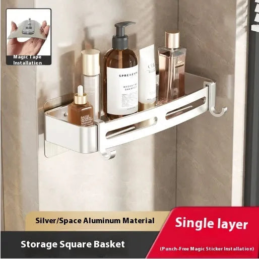 Gun Gray metal corner storage rack mounted on a bathroom wall, holding toiletries.