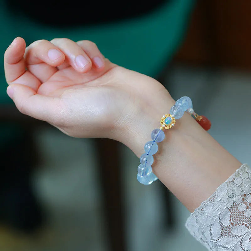 Aquamarine beaded bracelet with Chinese fengjiu fox charm in pearl or pink crystal colour variations