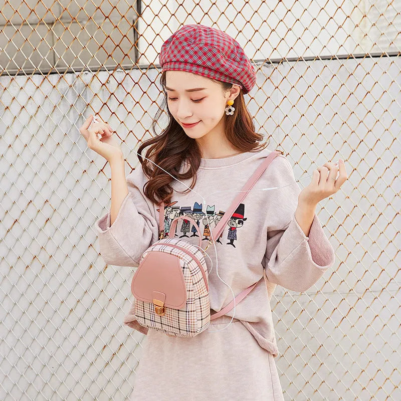 One shoulder diagonal phone bag in PU fabric shown in available colours: black, blue, brown, pink, red.