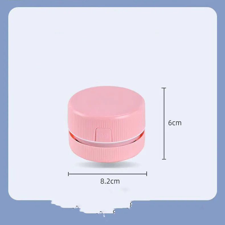 Mini handheld desktop vacuum cleaner in blue colour for pencil chip and soot removal