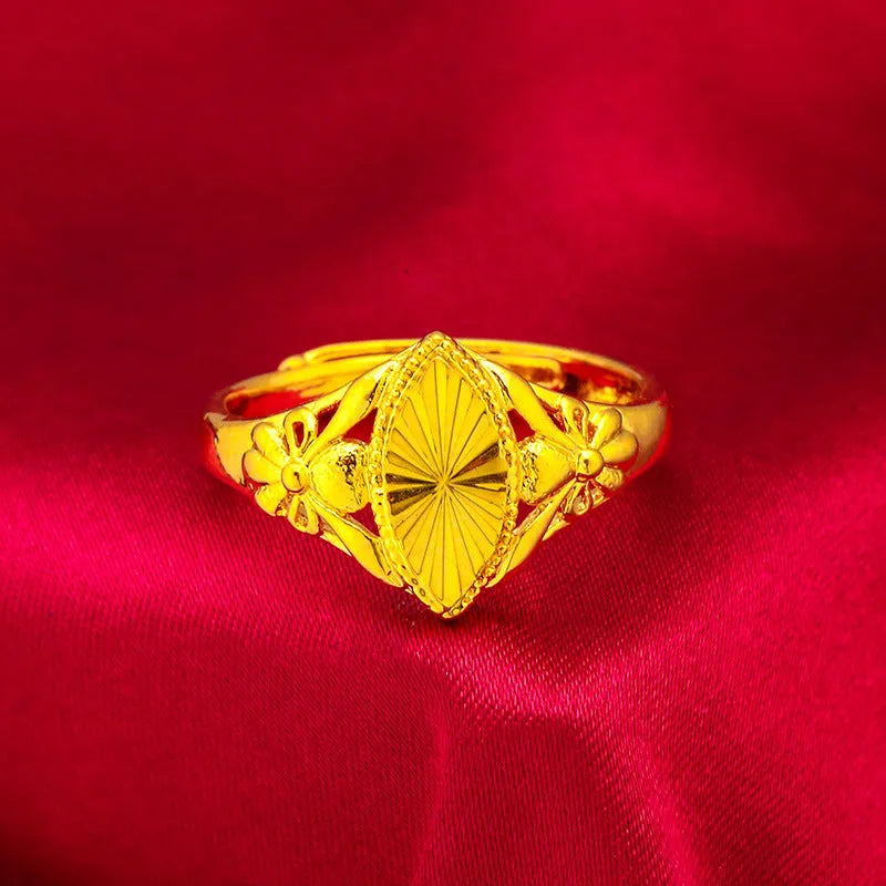 Alluvial gold electroplated brass ring with open diamond flower design and geometric texture