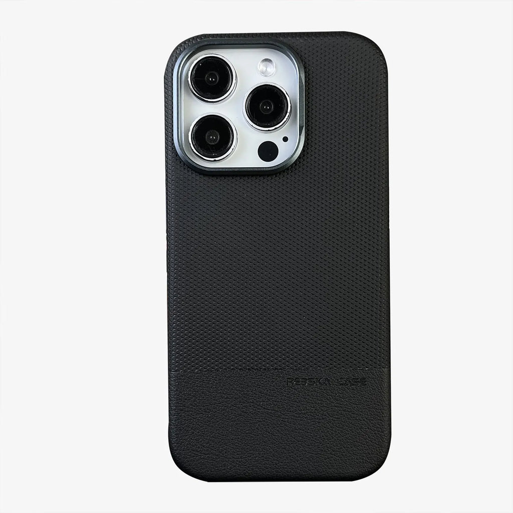 Black magnetic iPhone case with dragon scale texture and leather-style stitching, shown on an iPhone 15 Pro Max.