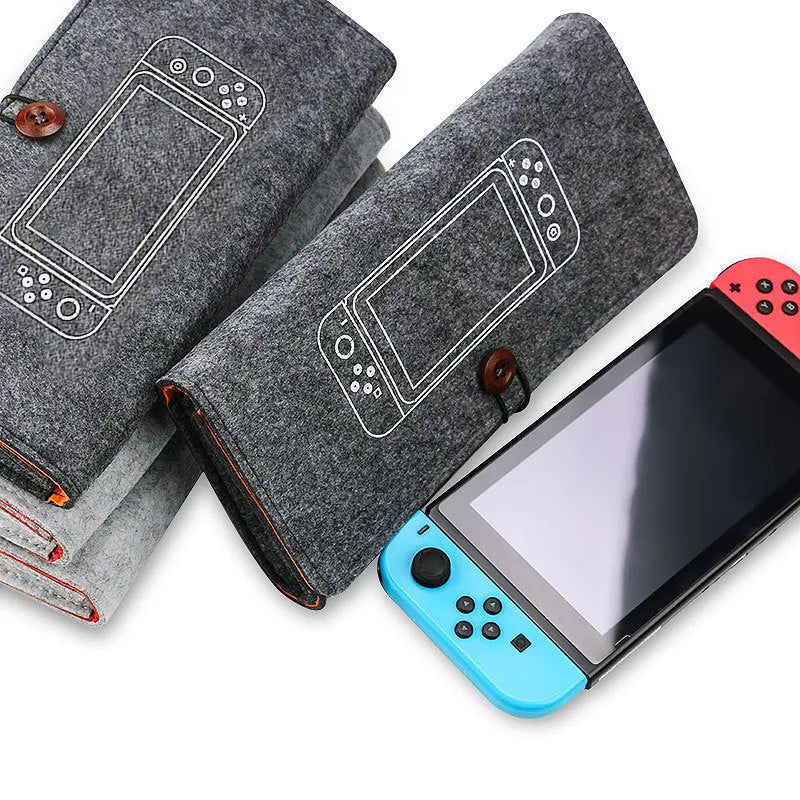 Black felt Nintendo Switch carrying pouch with game card slots and accessory compartments
