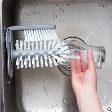 Grey double-head rotating cup brush with suction cups for wall mounting