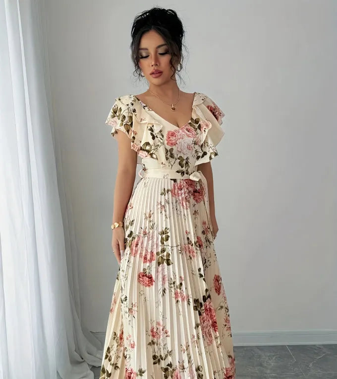 Apricot colour floral print V-neck dress with ruffled short sleeves and a pleated high-waist swing skirt.